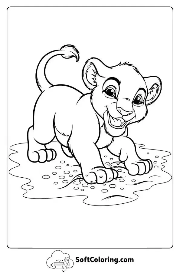 Happy Lion Cub Playing In The Sand